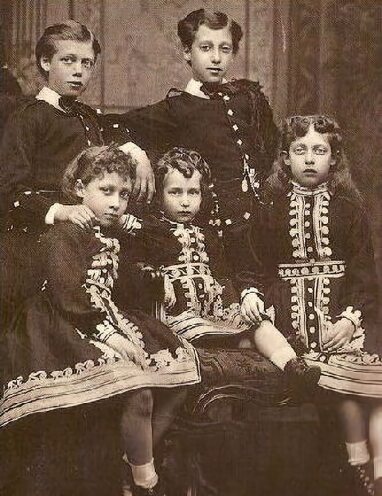 Princess Victoria with her brothers Albert Victor and George and her sisters Louise and Maud